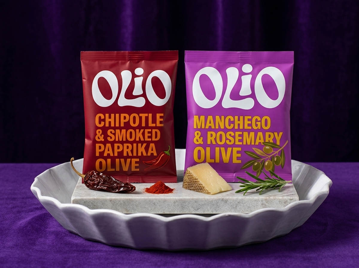 Chipotle & Smoked Paprika and Manchego & Rosemary olive pouches on a white ceramic dish